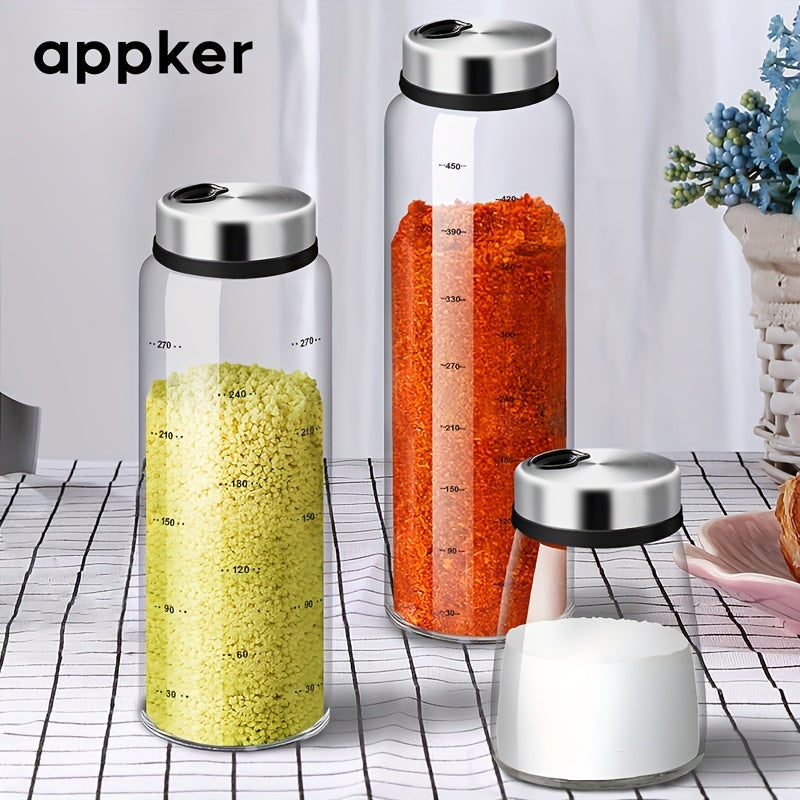 Clear glass spice jars with lids in 180ml, 300ml, and 500ml sizes, complete with spoons. Ideal for storing seasoning, salt, pepper, and other spices in the kitchen.