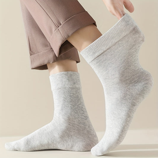 6 pairs of unisex cotton crew socks with loose-mouthed design for breathability and sweat absorption, offering soft and comfortable wear for both men and women. Trendy for business or