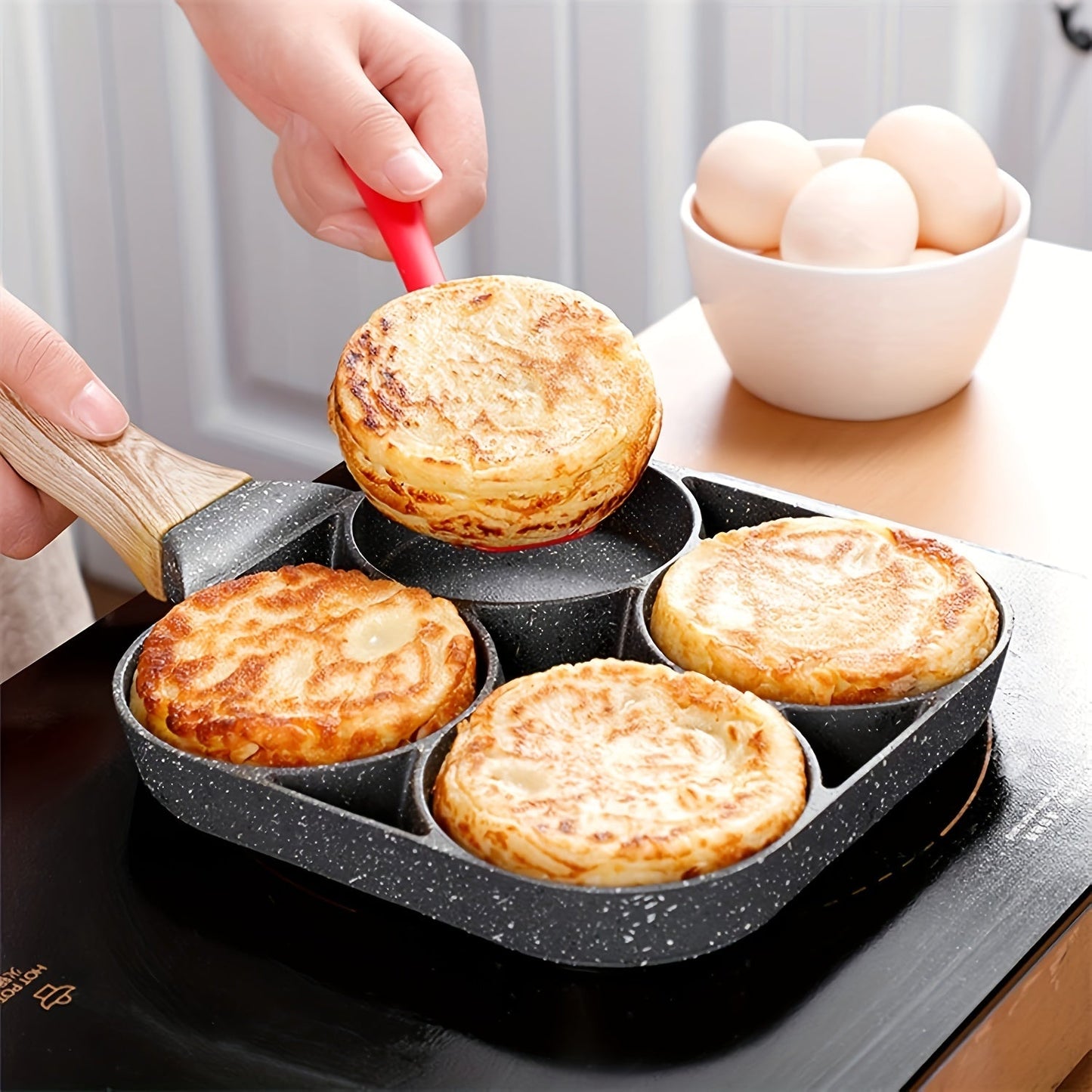 This 4-Cup Nonstick Cast Iron Egg Frying Pan is ideal for cooking pancakes, burgers, and breakfast dishes. It is easy to clean after use.