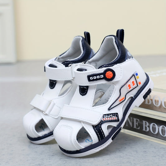 Stylish white sandals for boys with hook-and-loop closure, breathable PU upper, and TPR sole, ideal for casual wear in spring, summer, and fall.