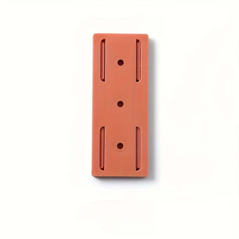 Wall-mounted storage for sockets with adhesive backing, suitable for various rooms and spaces such as living rooms, bedrooms, offices, bookshelves, and storage boxes. This socket holder requires no punching and leaves no trace when removed.