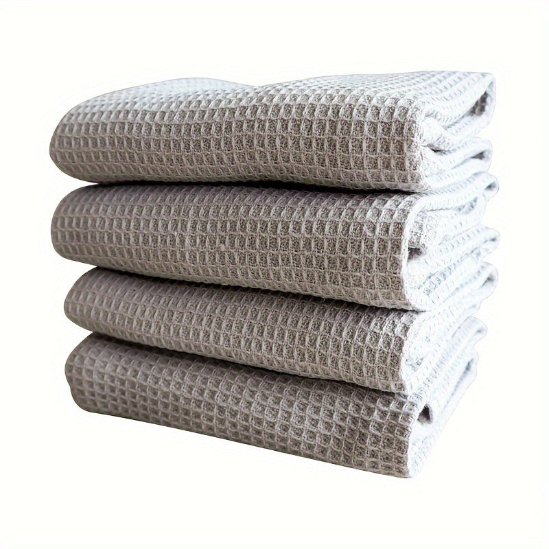 4 pieces of thickened waffle weave dish towels for household kitchen cleaning, absorbent and in mixed colors.