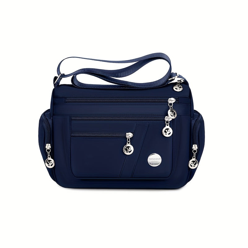 Women's versatile crossbody bag with adjustable strap, multiple compartments, zipper closure, and polyester lining for shopping, office, and travel, available in multiple colors.