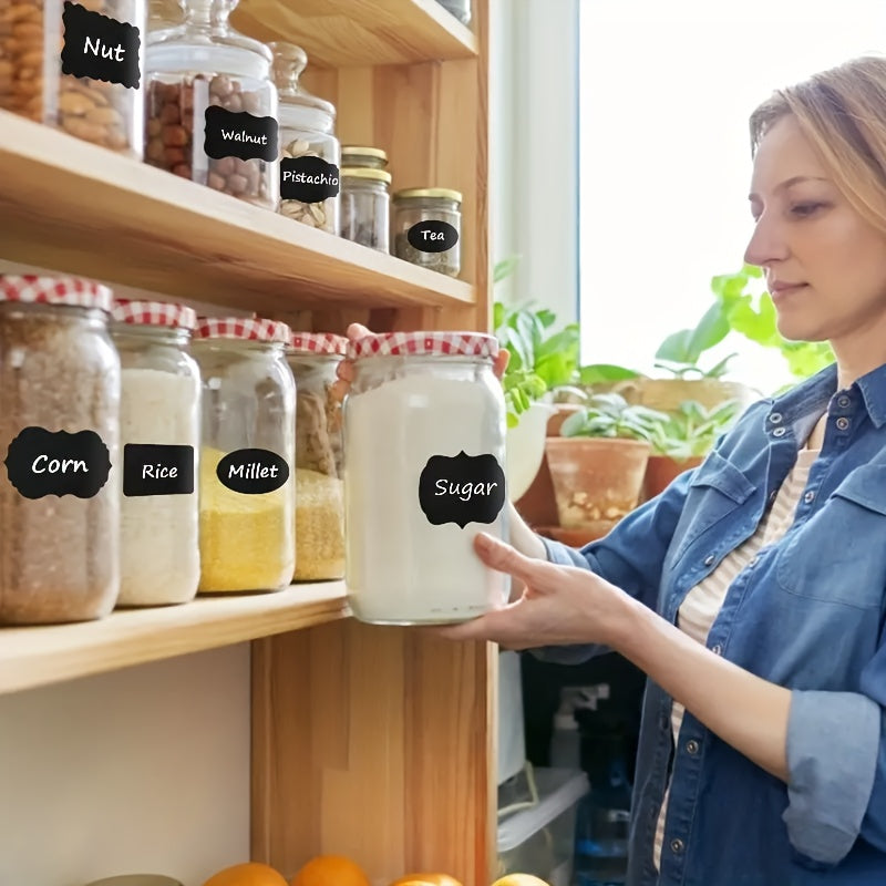 The set includes 120 black chalkboard label stickers that are both reusable and waterproof, perfect for organizing your kitchen. They feature a decorative wavy edge design and are ideal for labeling pantry containers, jars, and condiments for storage.