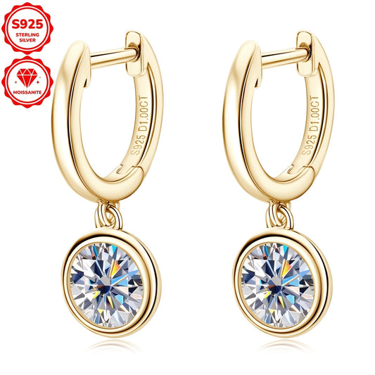 Pair of elegant Moissanite earrings with a silvery gram weight of 2.52g. Featuring two 6.5mm Moissanite stones totaling 1.0 carat each, set in 925 Sterling Silver. These round Moissanite earrings are perfect for adding a touch of glamour to any outfit