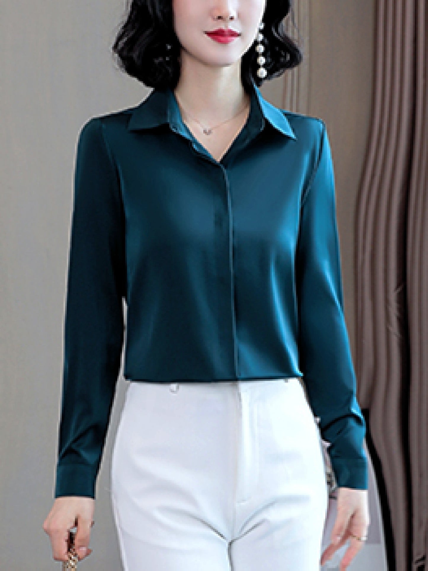 Long sleeve satin shirt with solid color, collared button-up design for women. Machine washable and perfect for spring/fall. Ideal for sophisticated adults with luxurious style.