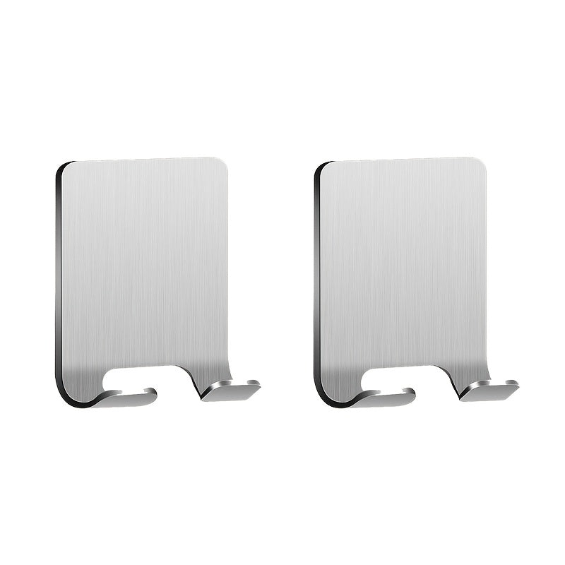 2 silver adhesive wall hooks for bathroom, bedroom, or kitchen. No drilling necessary. Made of stainless steel. Can hold shaver, hat, robe, or other items.