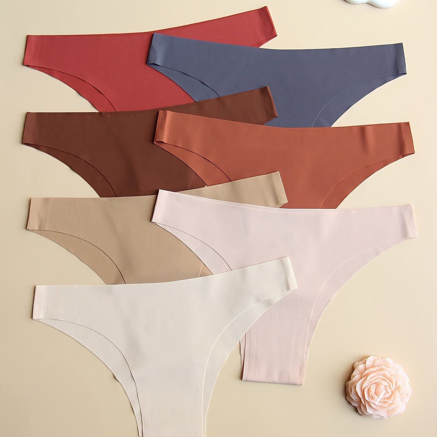 7-pack of seamless low-rise women's panties in solid colors. Stretchy, no-track, comfortable, breathable, and soft. Simple style.