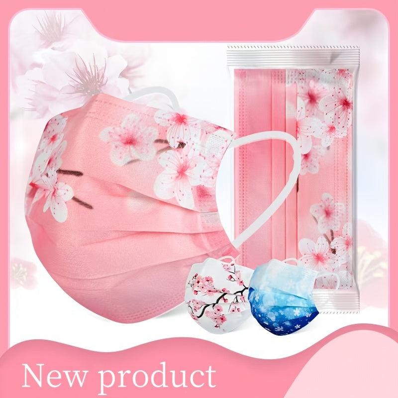 Pack of 50 Romantic floral and starry sky printed face masks designed for women. These masks are made with 3 layers of woven polypropylene and have elastic, breathable, and sun-protective qualities. They are disposable and come with wide ear loops for a