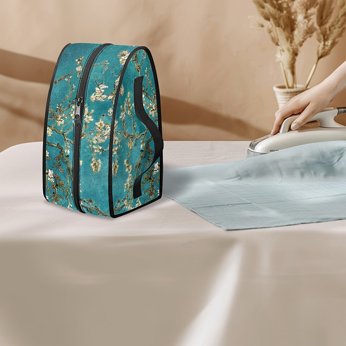 Portable iron storage bag inspired by Van Gogh, designed to protect your iron from dust. This non-electric carrying case features dual zippers and a convenient handle, making it the perfect organizer for your ironing accessories.