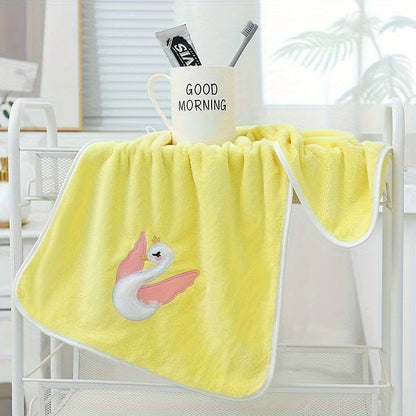 A 75*35cm Cartoon Swan Kid's Bath Towel with premium softness, absorbency, and quick-drying capability, ideal for use in the bathroom or at home.