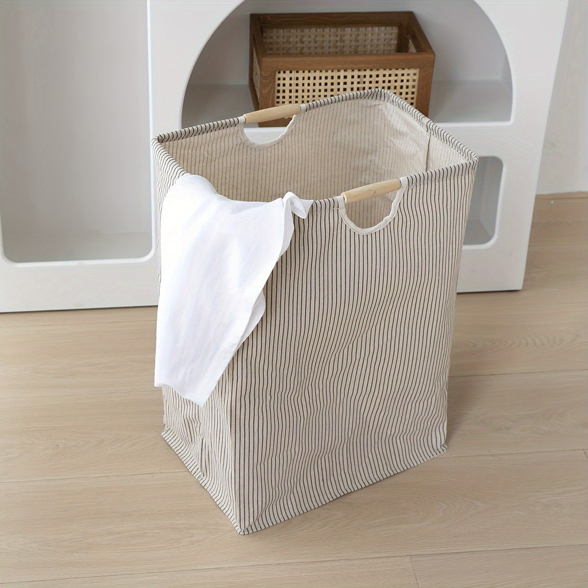 Fold and store your laundry easily with this 1-piece collapsible laundry basket. Featuring handles for easy transportation, this large hamper is perfect for storing clothes, towels, and toys in your family or dorm. Keep your bathroom, bedroom, or laundry