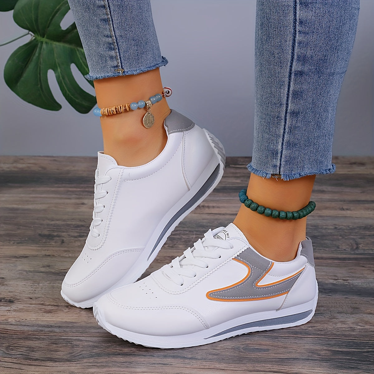 Trendy colorblock women's sneakers with soft platform sole, lace-up design, perfect for casual walking.