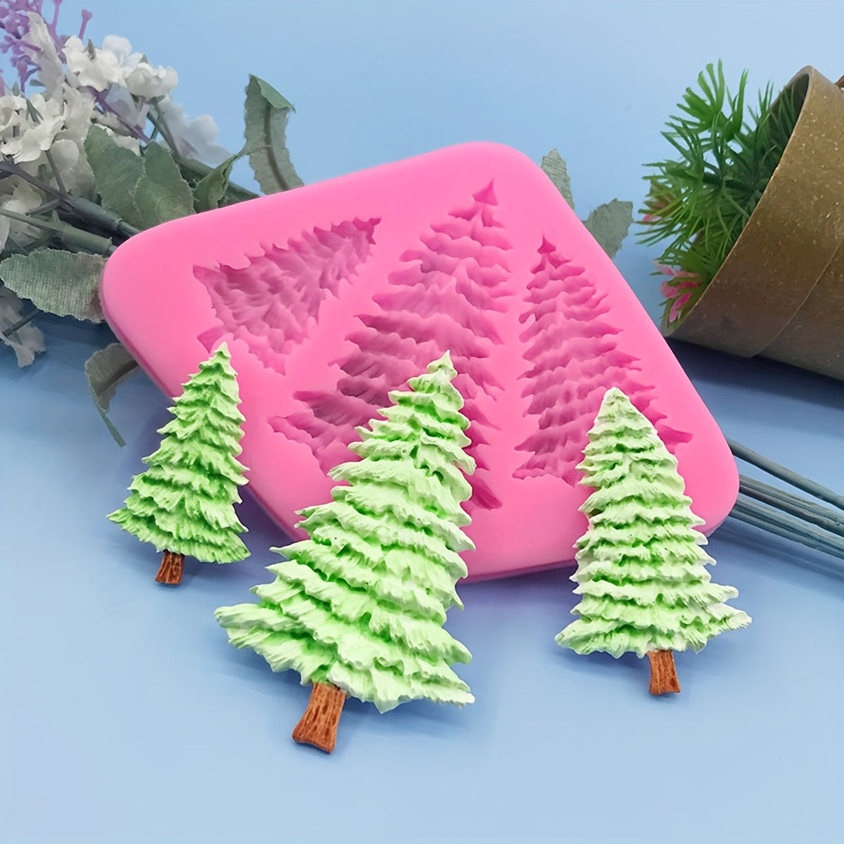 Silicone mold for a Christmas tree pine tree, perfect for making 3D fondant, pudding, chocolate, candy, desserts, gummy treats, handmade soap, aromatherapy candles, plaster, polymer clay, and ice cubes. Ideal for baking, cake decorating, and other