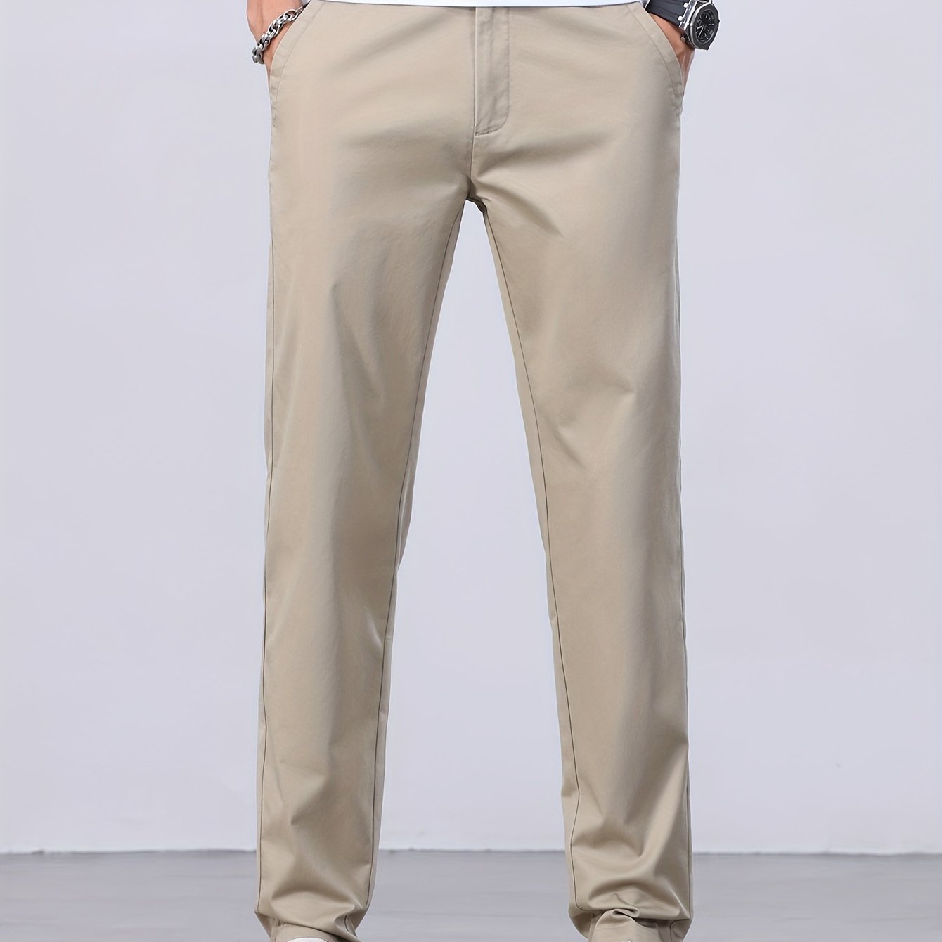 1 Men's all-season casual pants in caramel color, made of cotton blend with slight stretch and regular fit, featuring mid waist, pockets, zipper fly, and woven work style for weekend casual.