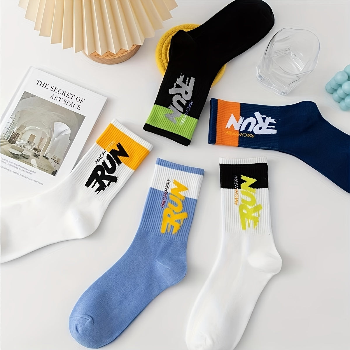 Men's mid-calf crew socks with 5 pair letter pattern, perfect for outdoor sports.