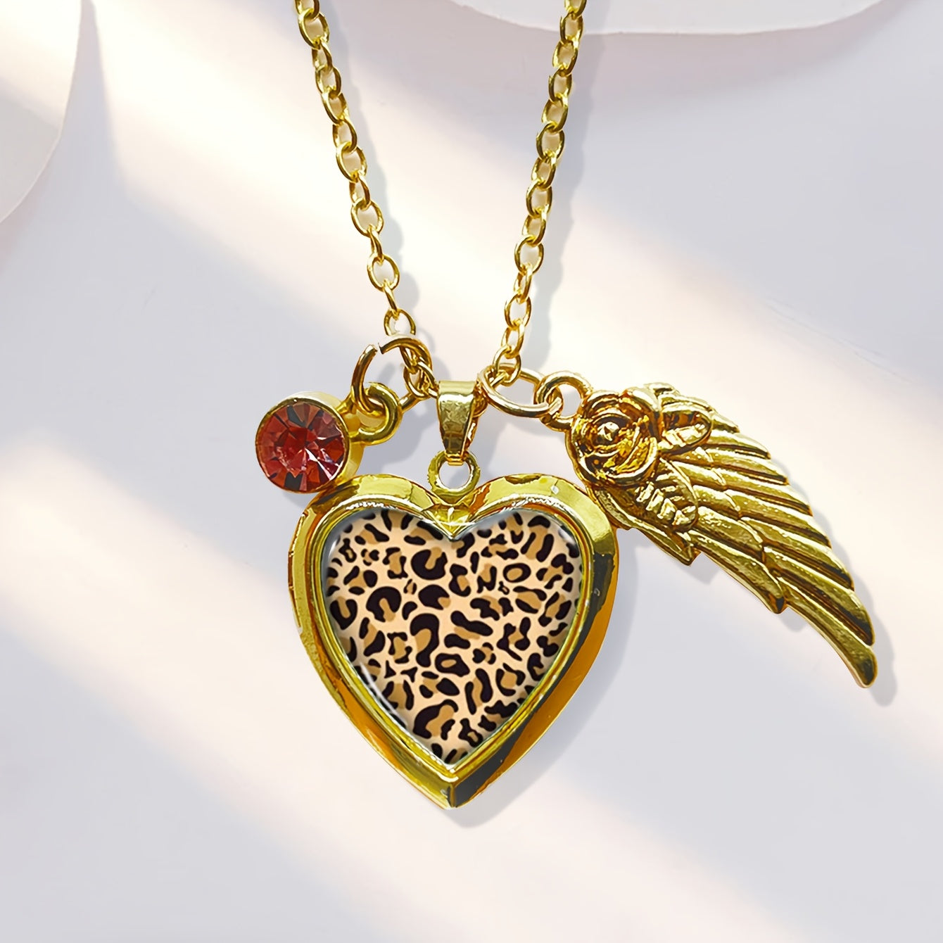 Stylish Heart-Shaped Photo Locket Necklace with Leopard Print Design, December Birthstone, Rhinestone Detail, Copper Material - Comes in a Red Gift Box, Ideal for Valentine's Day or Anniversary Celebrations, Golden Color, Wing Accent