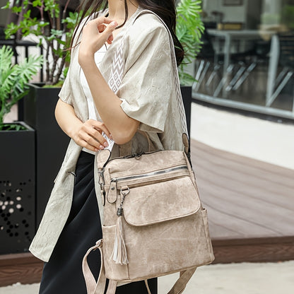 Retro brown women's fashion backpack with large capacity and versatile design, including multiple zippers. Can also be used as a crossbody or shoulder bag.