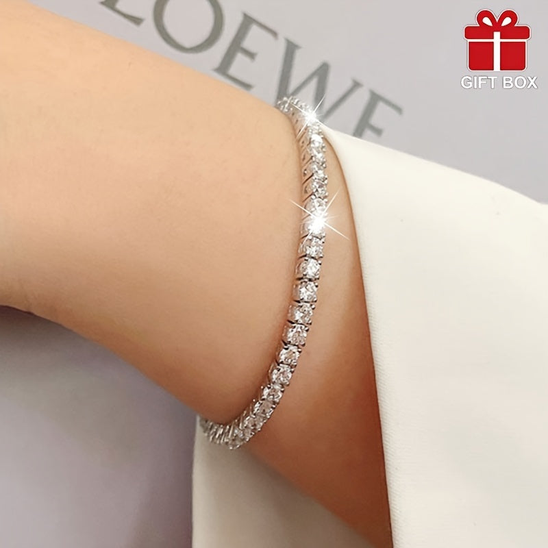 One piece of elegant titanium steel jewelry for women with a 14K golden plated tennis bracelet featuring synthetic cubic zirconia. Perfect for daily or festival wear, this piece makes for an ideal Mother's Day gift and comes in a gift box.