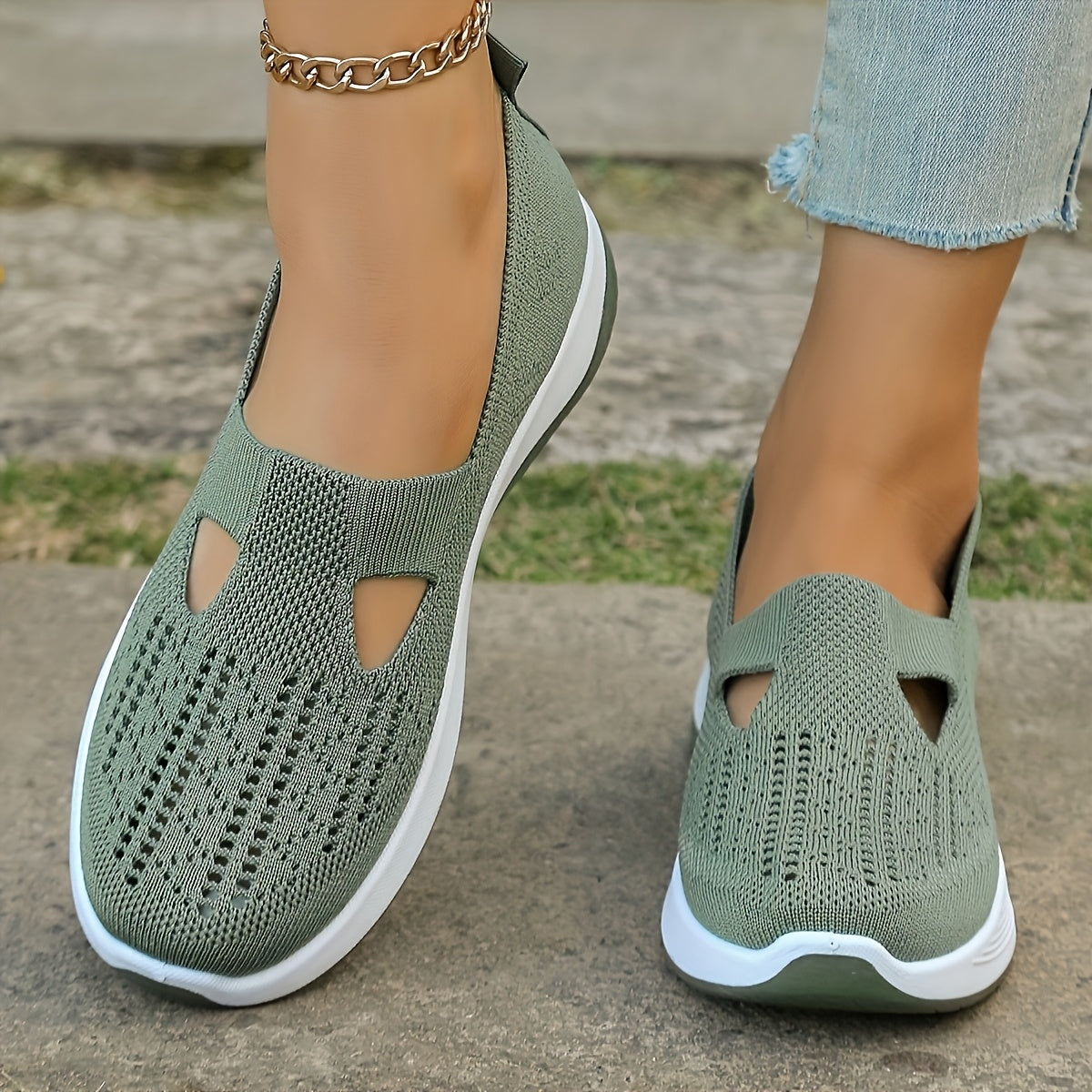 Breathable mesh slip-on sneakers with PVC sole, fabric insole, and lining for stability and comfort. Perfect for casual outdoor wear in spring and summer. Features cut-out patterns and