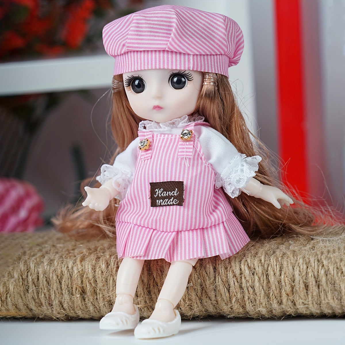 Pink fashion doll for girls with removable clothes, PVC material, articulated joints, plaid skirt, sweater design, perfect birthday gift.