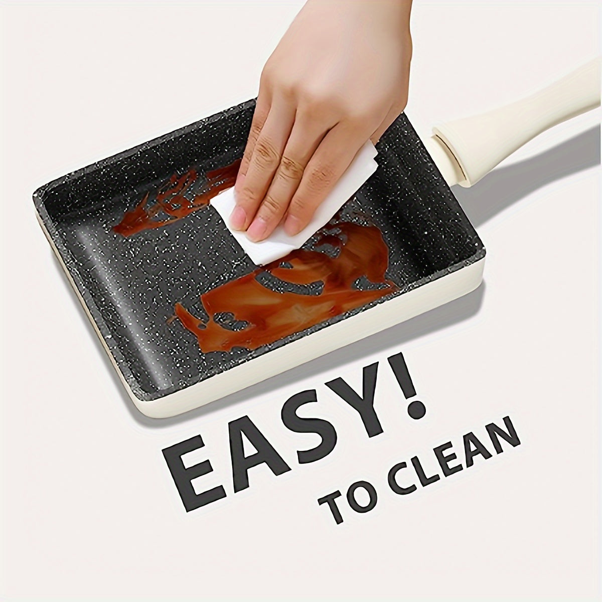 Non-stick granite stone omelette pan for Japanese Tamagoyaki, made from aluminum with a silicone handle. This hand wash only pan is PFOA free and suitable for use on induction and all stove types. Dimensions are 13.46cm x 18.29cm, ideal for egg cooking.