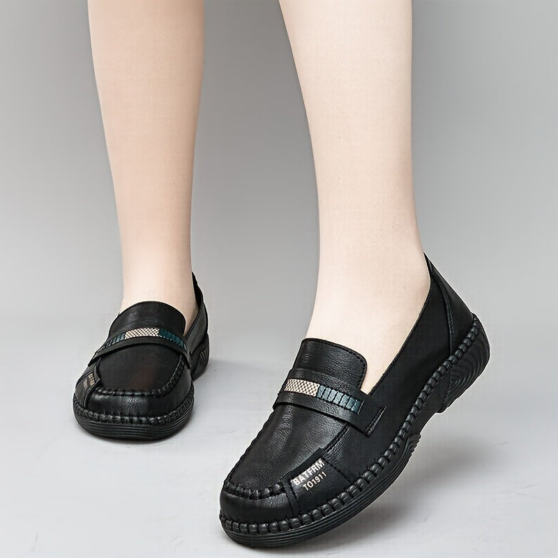 Women's comfortable round toe flat slip-on shoes for walking outdoors.