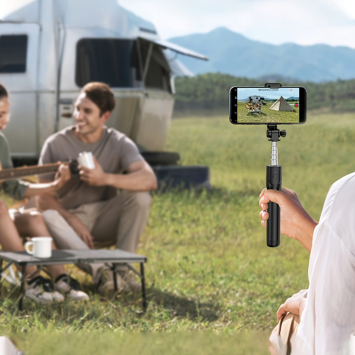 Multi-purpose wireless selfie stick with tripod, remote control, phone holder, and live streaming capabilities, perfect for travel and taking photos.