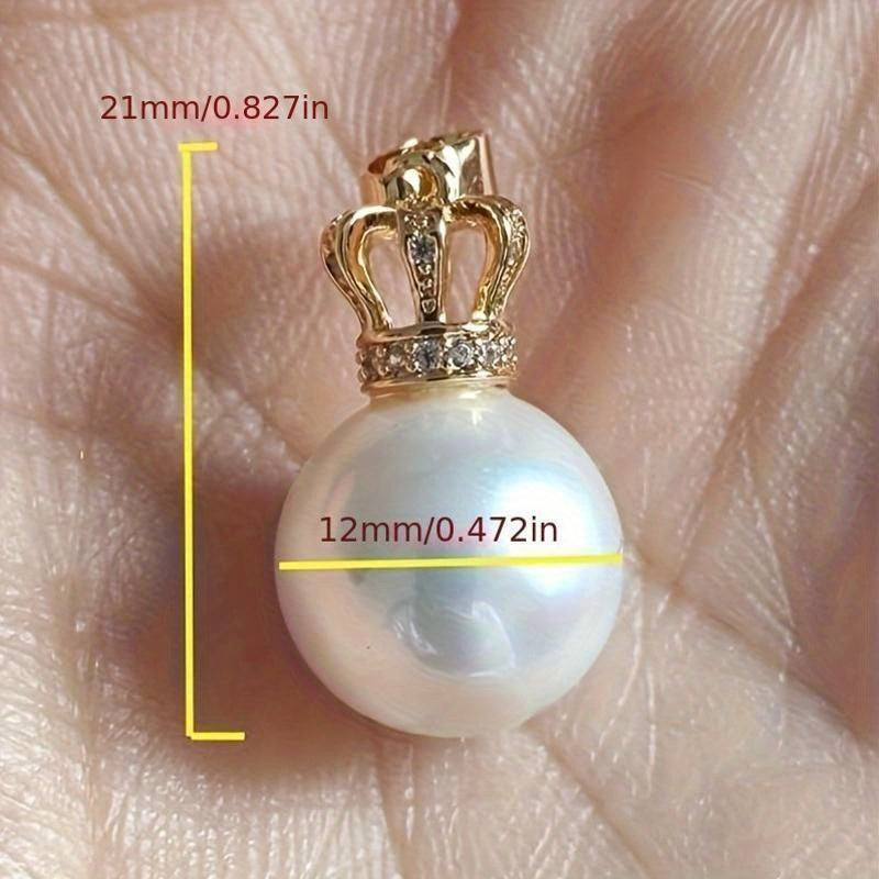 Luxurious Ladies Necklace with Crown Buckle Shell Pearl Pendant in 14K Gold Plating, featuring a 12mm Round Strong Light Pearl. This Noble and Elegant pendant epitomizes luxury, with its flawless design and fashion-forward appeal.