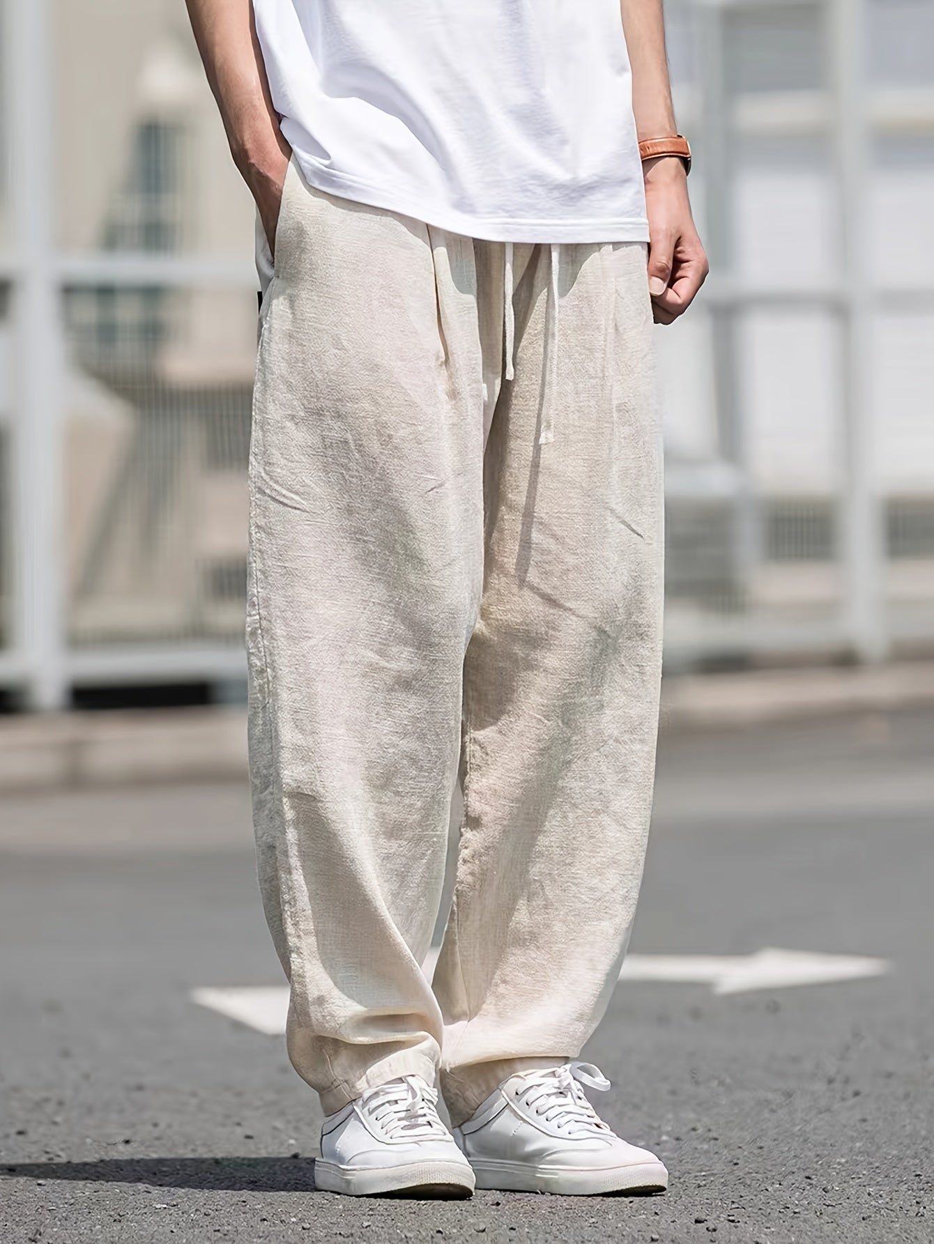 Street style drawstring trousers for men with a loose fit.