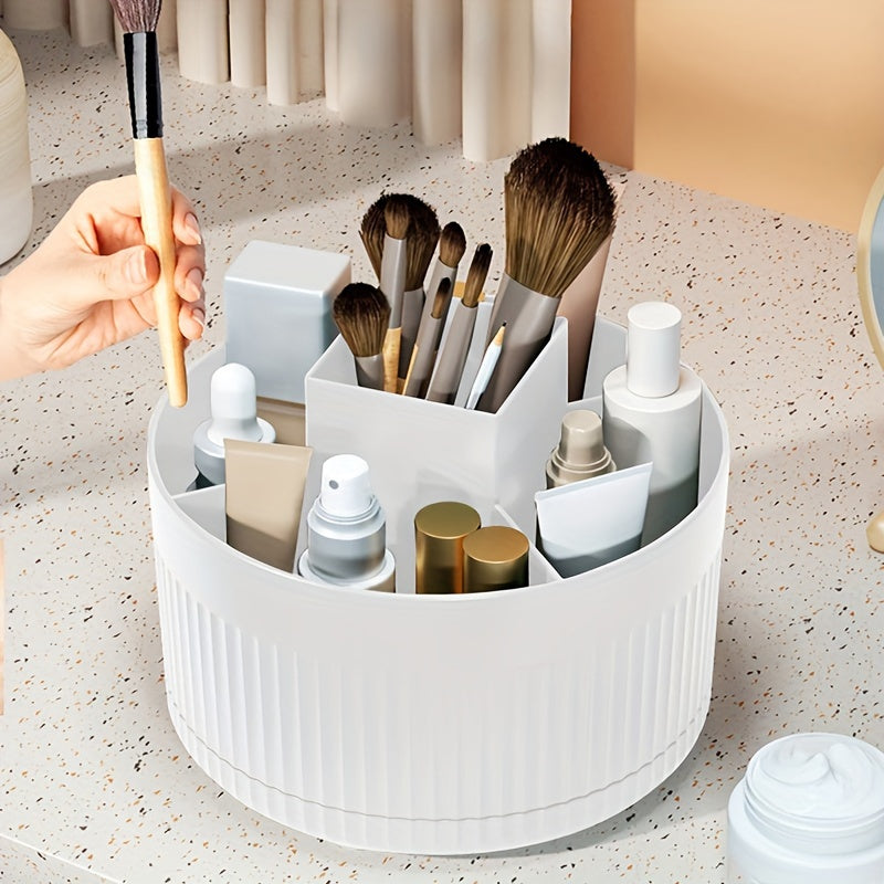 White rotating makeup organizer with textured design, durable plastic, no assembly necessary. Ideal for storing brushes, skincare products, and beauty tools.