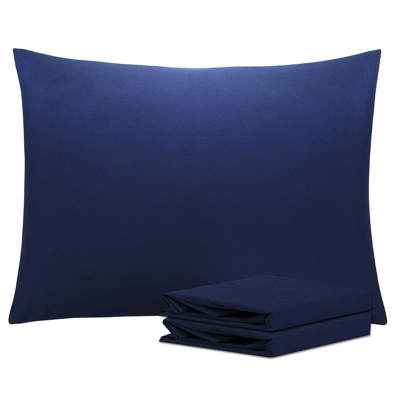 Get two sets of white pillowcases that are perfect for families, hotels, and apartments. These pillowcases provide a comfortable experience with their soft and breathable material. Made of high-quality fabric, they are suitable for bedroom, sofa, and