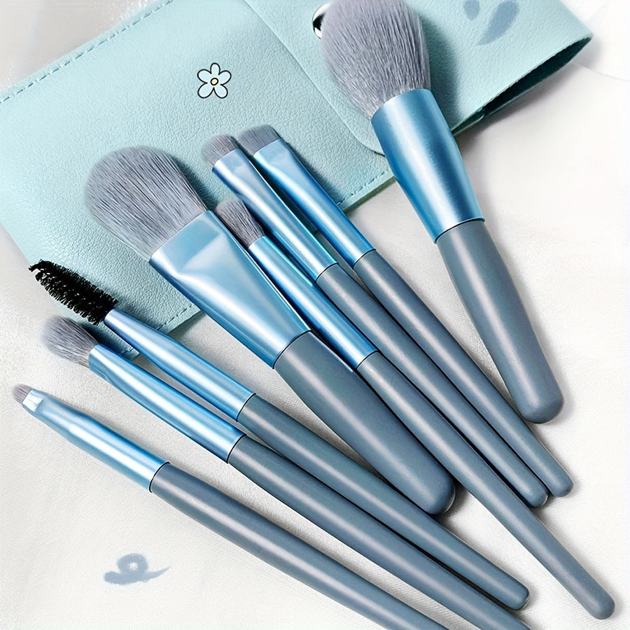 8 soft, portable facial makeup brushes in blue for entry-level beauty tools. Includes eyeshadow, nose shadow, blush, lip brush, eyelash comb, and travel powder brush. Ideal gift for beauty