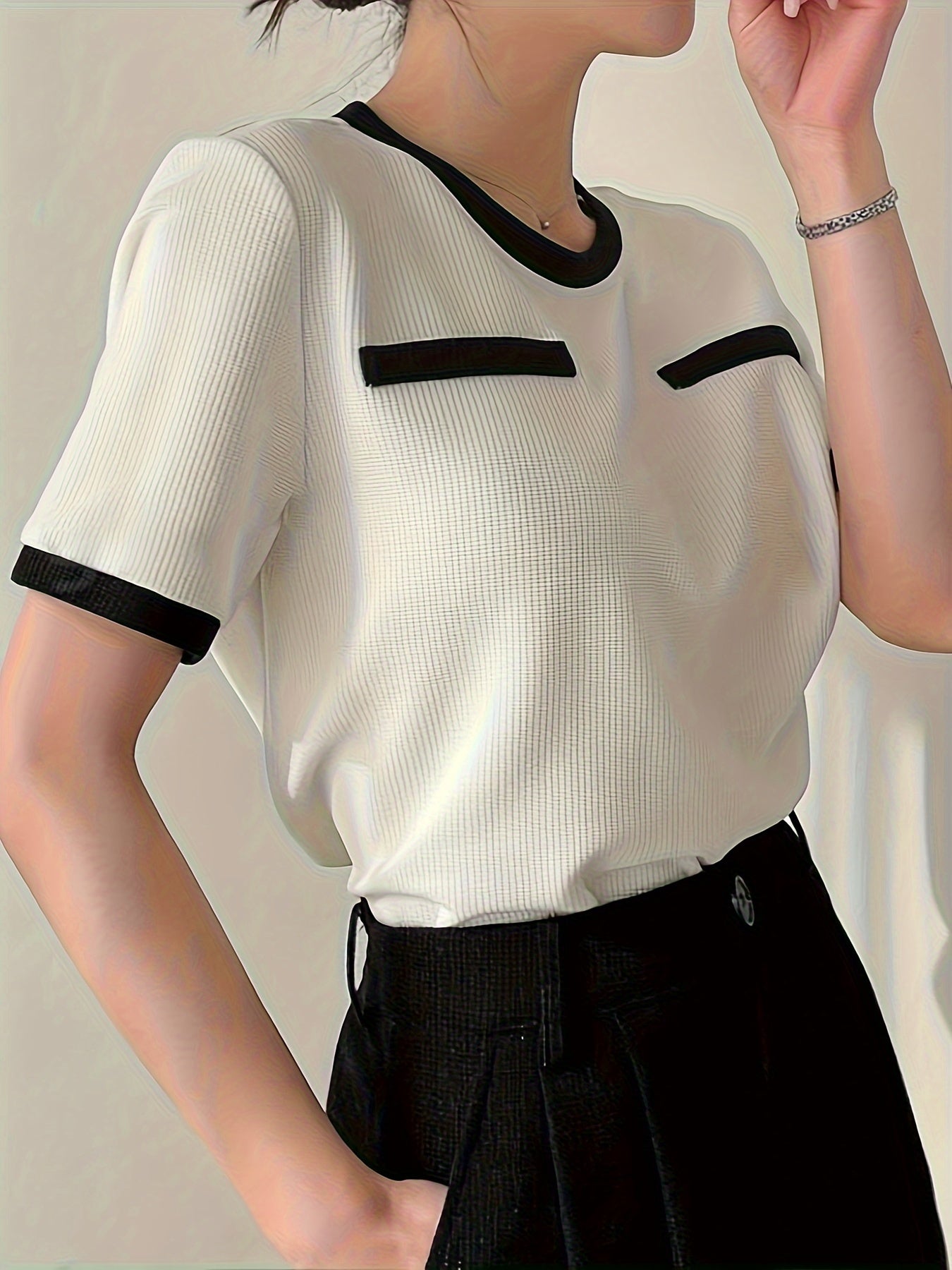 Timeless appeal, women's crew neck blouse in color block design. Made of soft polyester, machine washable, suitable for all seasons.