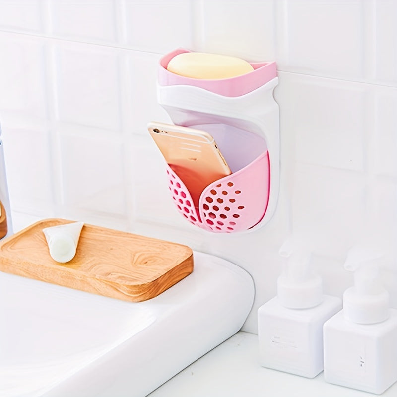 Wall-mounted soap dish with strong adhesive and double-layer design. No-drill drainage system for bathroom and kitchen storage. Features a creative suction cup and soap box.