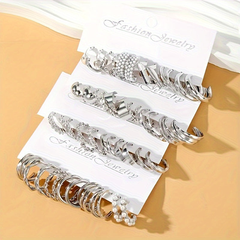 48-piece set of hoop earrings for women, featuring elegant geometric and heart designs embellished with faux pearl accents. Made with stainless steel posts, these earrings are perfect for casual attire and make great gifts.