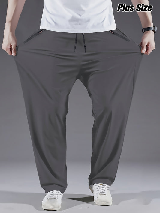 Men's plus size polyester sports pants with slight stretch fabric, solid color, casual style, suitable for spring/summer.