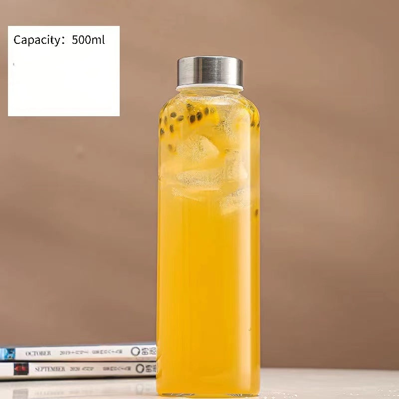 This borosilicate glass bottle comes with both a stainless steel lid and a wooden bamboo lid, making it perfect for travel and storing a variety of beverages such as juice, smoothies, kombucha, kefir, and tea. It is 100% leakproof and can be safely used