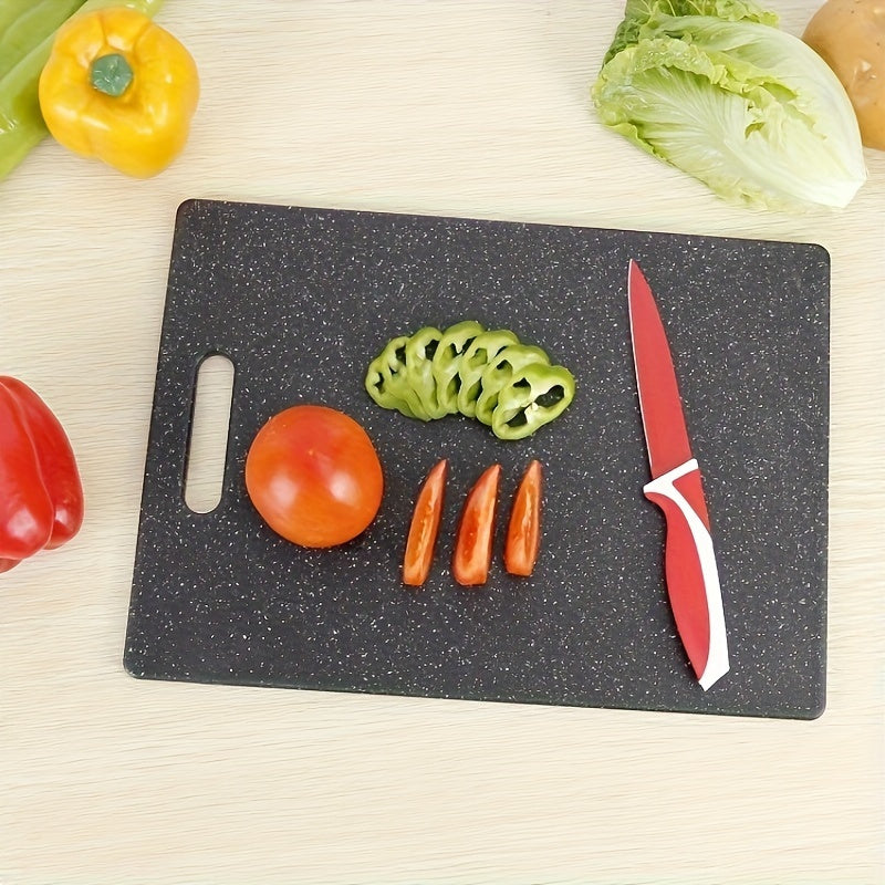 Set of three cutting boards with a marble pattern made of food-safe polystyrene. Suitable for chopping fruits and vegetables, these boards are durable, easy to clean, and feature a stylish black and white marble design.