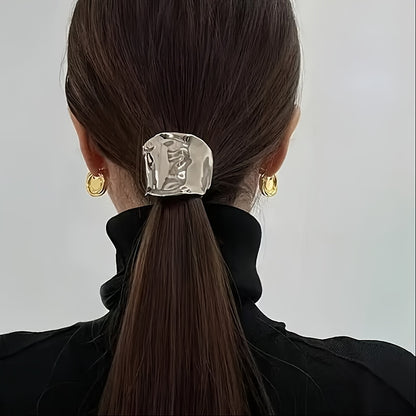 Customers love the elegant golden hairband, a fashionable ponytail holder that complements other golden accessories.