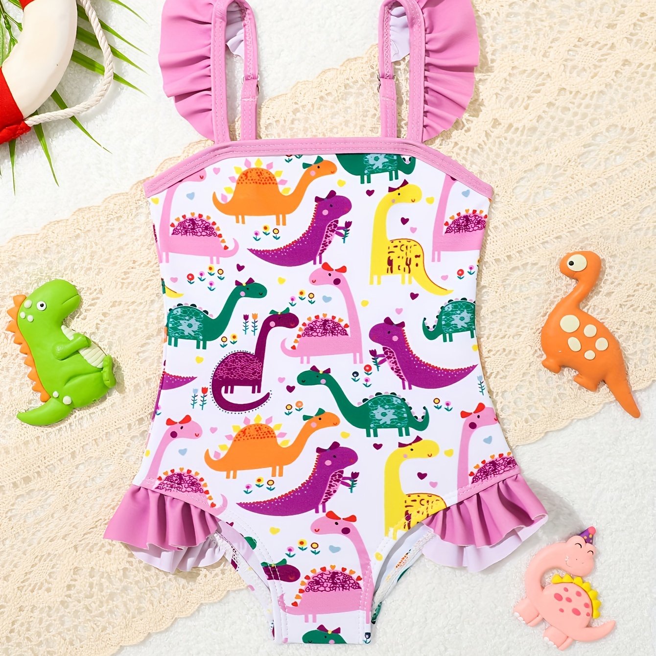 Adorable pineapple pattern one-piece girls' swimsuit in quick-dry, stretchy polyester with ruffle detail, off-shoulder design for toddlers.