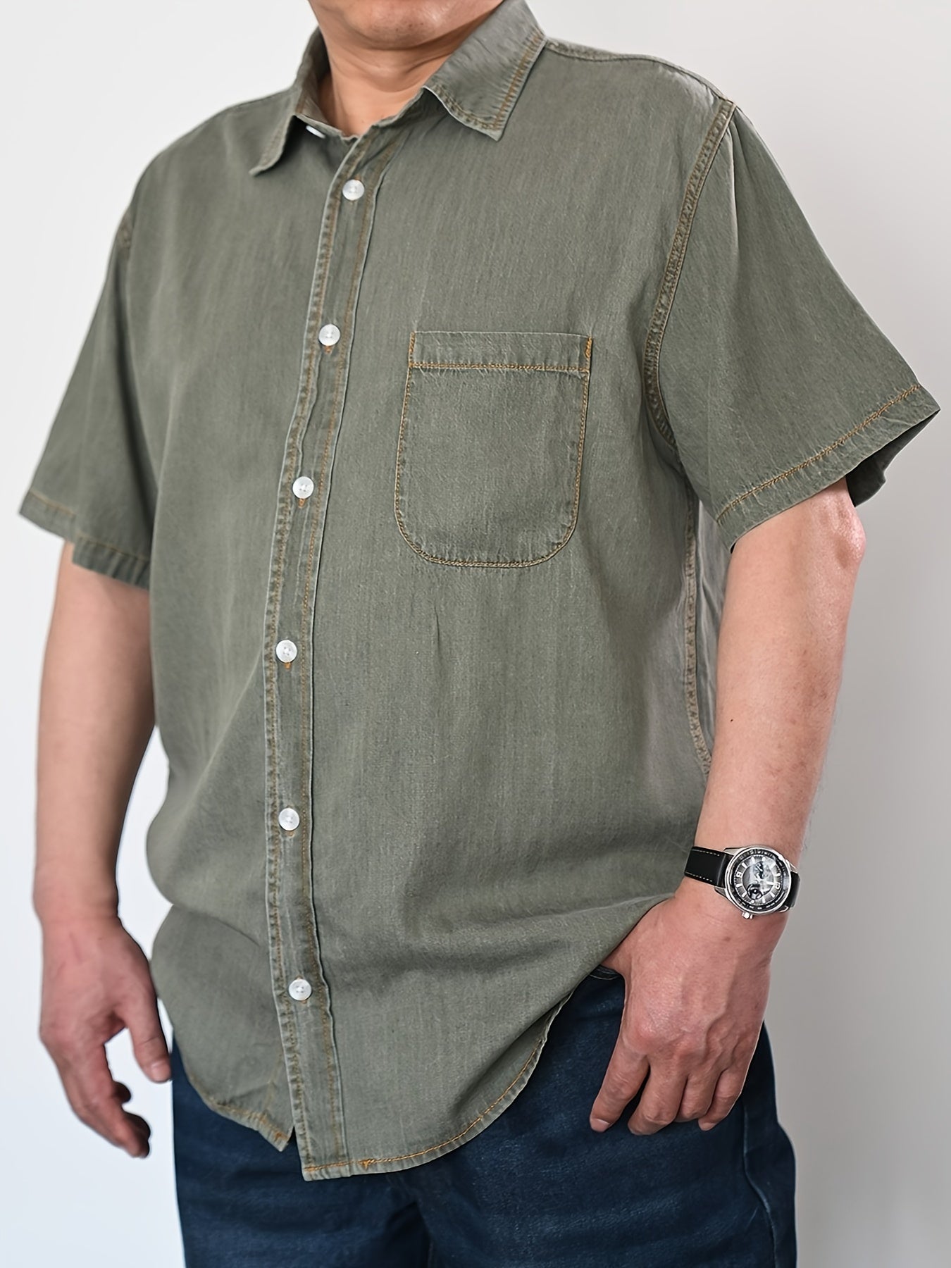 Summer-ready plus size men's denim shirt with vintage flair, V-neck, and button detail. Cotton and lyocell blend, machine washable. Plus size.