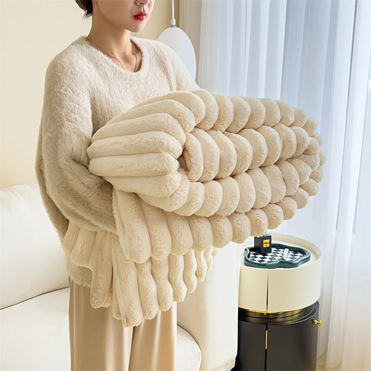 Indulge in the comfort of our luxurious plush blanket - a cozy fleece throw that will keep you warm and snuggled up on the sofa. This soft and insulating blanket is not only perfect for lounging, but also machine washable for easy care. Its modern style