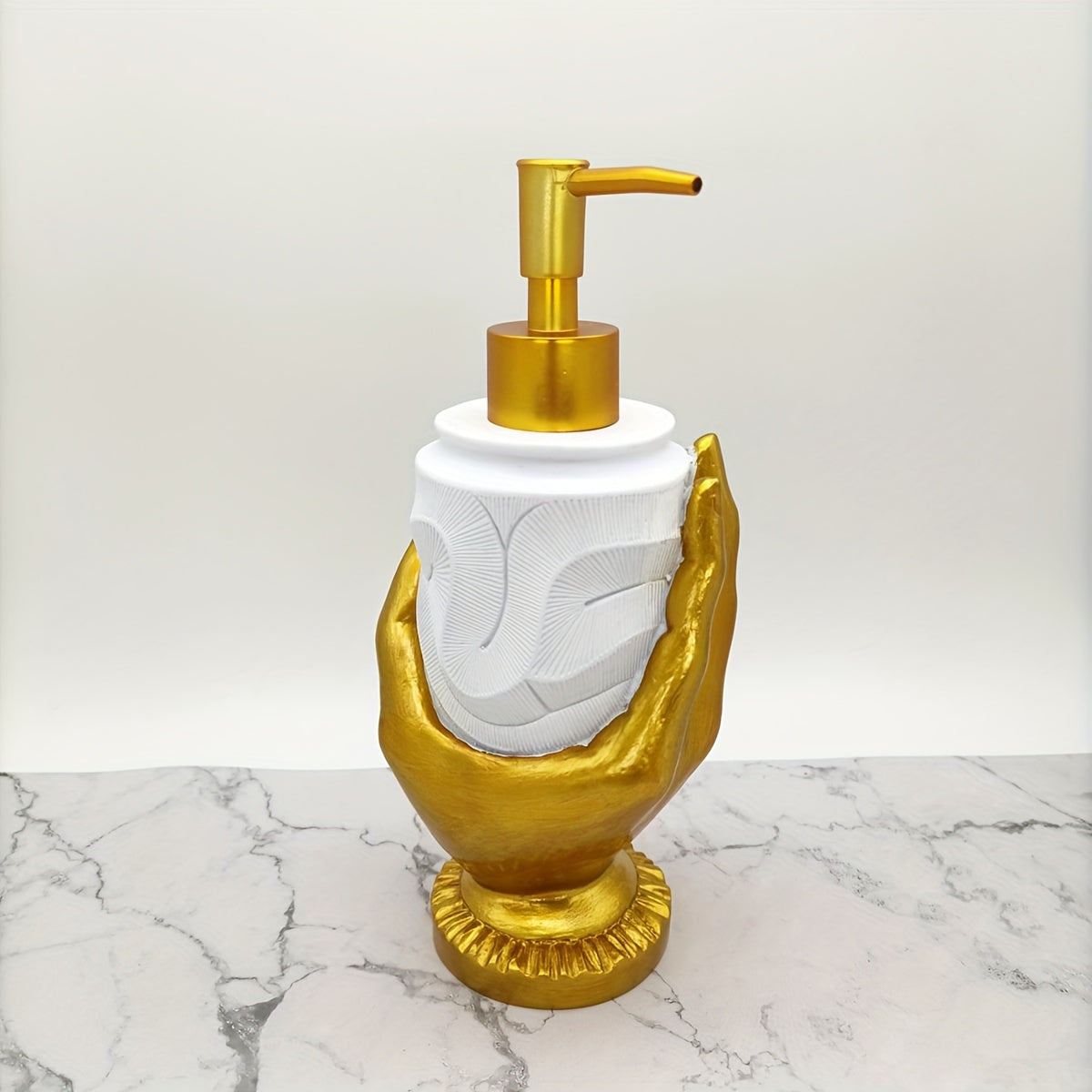 Elegant gold fingerprint resin soap dispenser, mercury-free with textured design. Ideal for bathroom and kitchen decor. Made of resin.