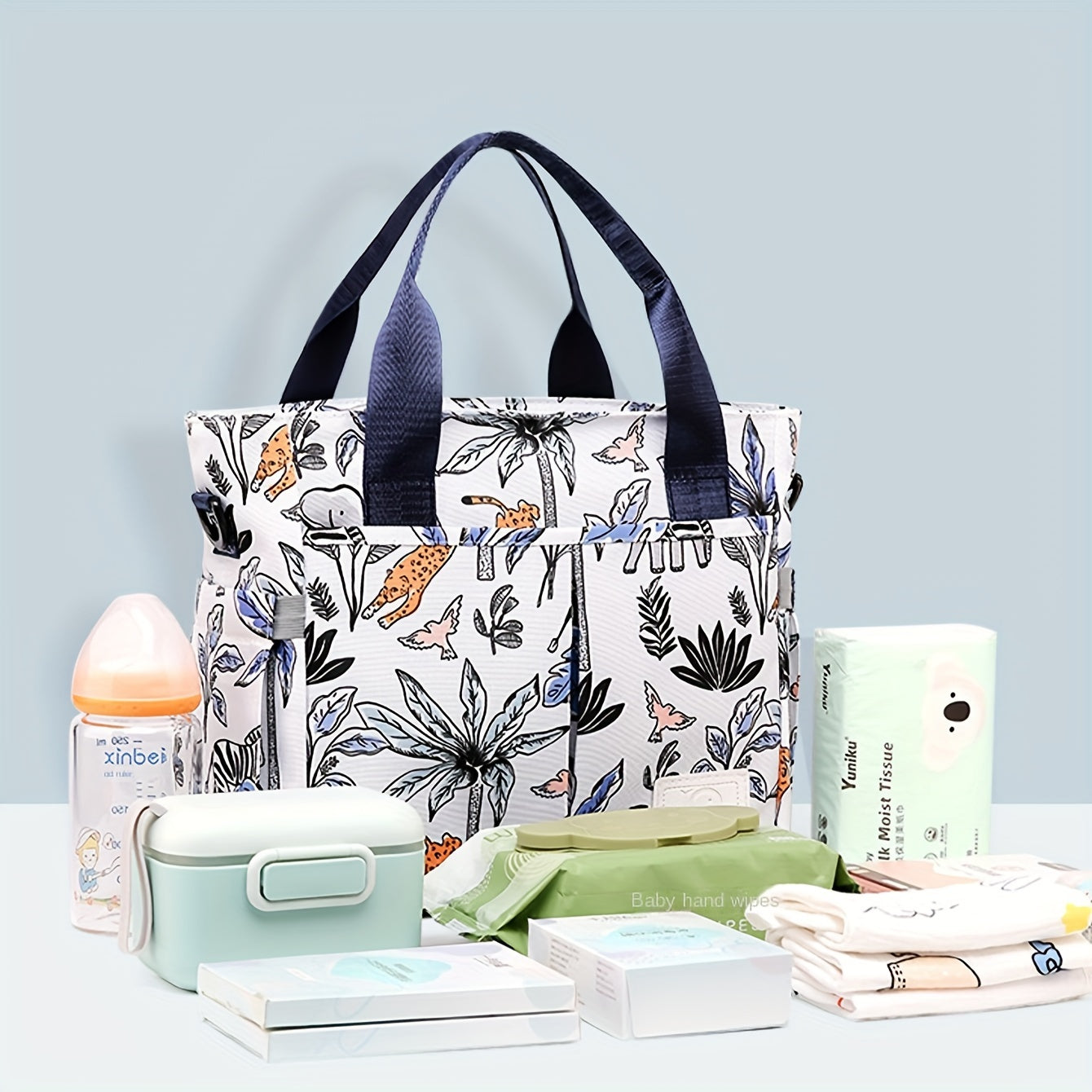 Parent Bag Designed with Stylish Floral Pattern - Large Oxford Fabric Organizer for Diapers and Kids' Essentials, Featuring Multiple Compartments and Shoulder Strap for Easy Carrying