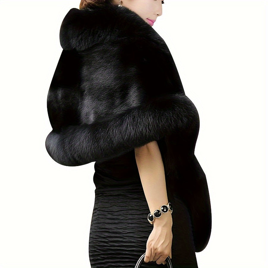 Luxurious black wrap shawl with white trim, perfect for evening events.