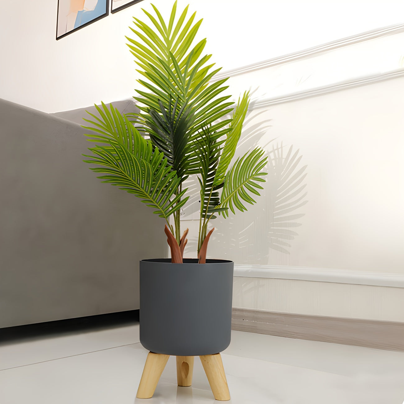 Wooden leg planter for indoor/outdoor use in home or office, suitable for various plants.