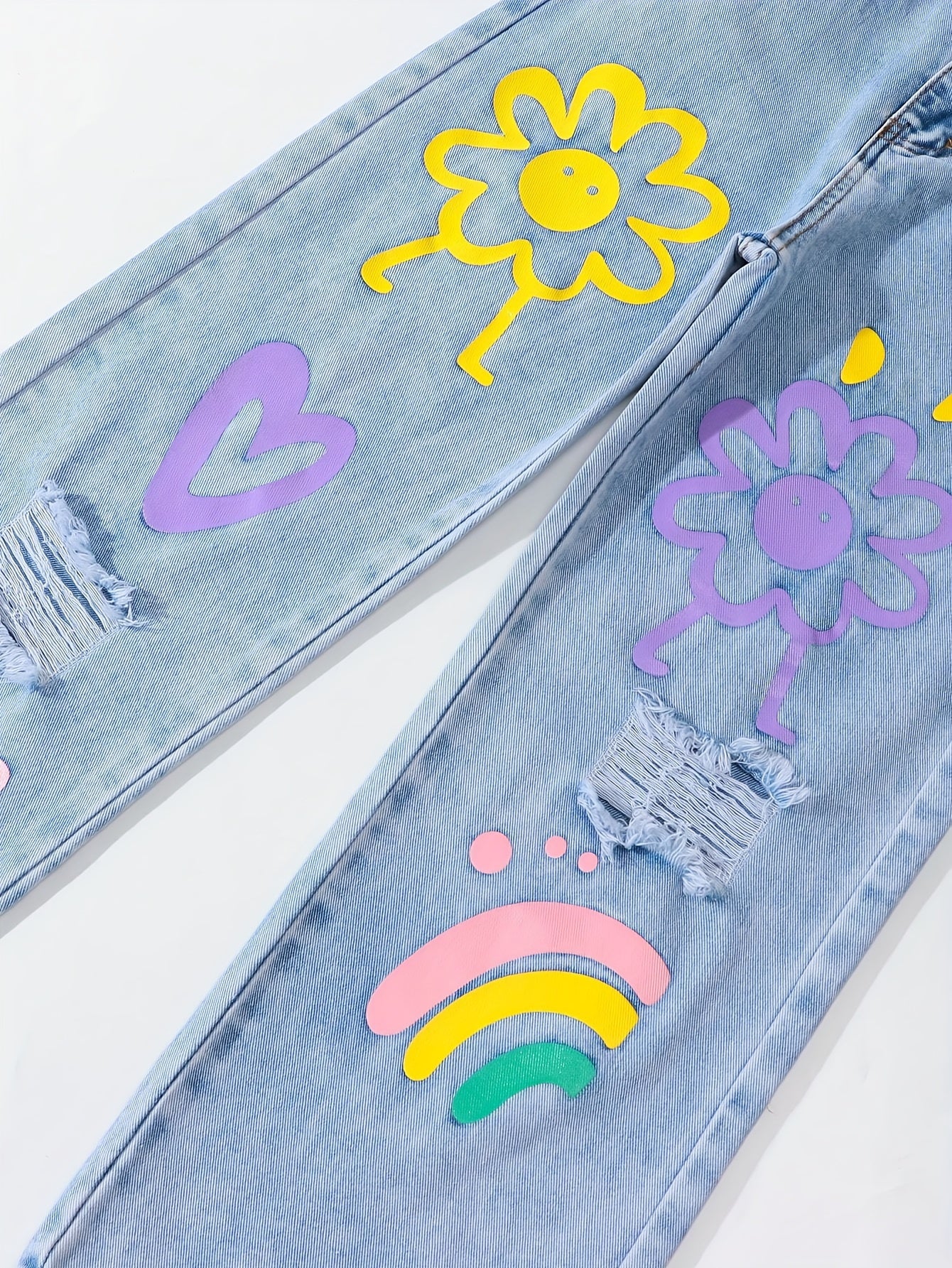 Y2K-inspired straight-leg jeans for girls with elastic waist. Features heart and flower designs, rainbow accents. Comfy, non-stretch denim. Perfect for school, skateboarding, and