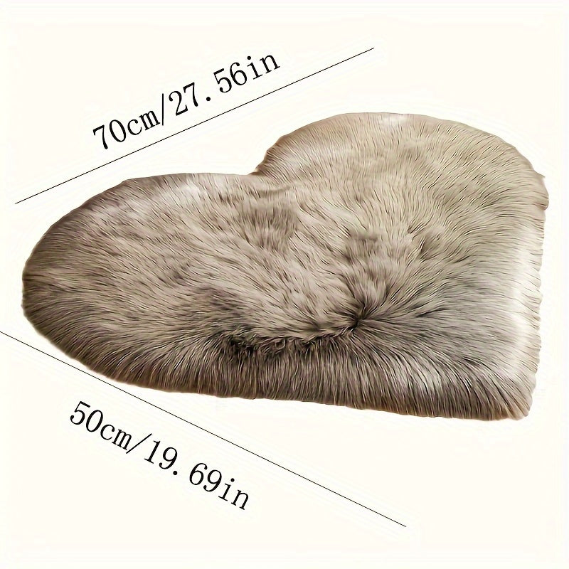 Heart-Shaped Faux Sheepskin Rug - Perfect for Celebrating Special Occasions!

Add a touch of festive charm to your home with this adorable 1pc Heart-Shaped Faux Sheepskin Rug. Measuring 50.01cm x 70.0cm, this rug is made from a soft blend of acrylic and