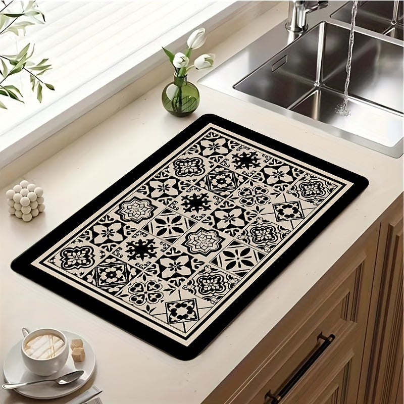 A necessary addition to any home, this retro-inspired printed tableware drying mat adds a touch of ethnic style to your kitchen. Perfect for keeping your kitchen utensils, coffee table, and coffee machine dry and clean, this versatile mat is a must-have